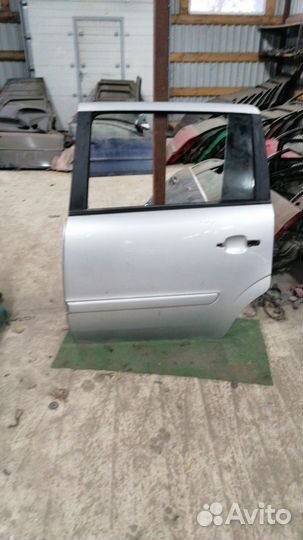 Дверь задняя левая Зафира В 2008г.в