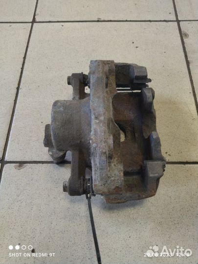 Суппорт тормозной передний левый Volkswagen Polo