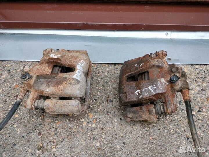 Суппорт тормозной передний правый Fiat Doblo