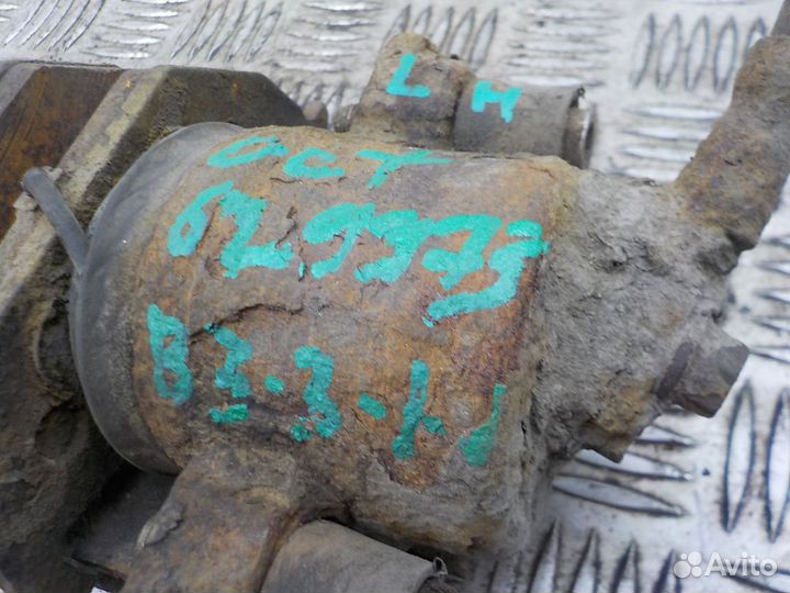 Суппорт тормозной передний левый Skoda Octavia 200