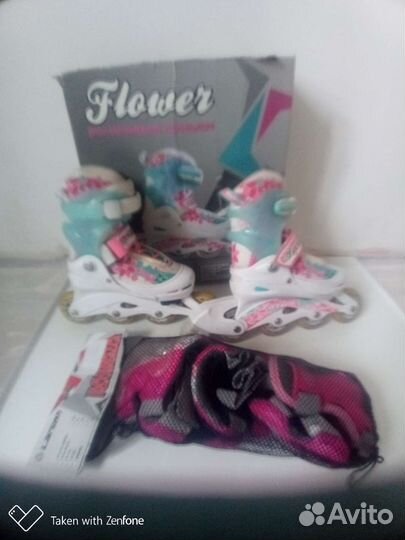 Роликовые коньки