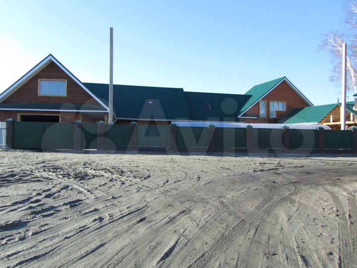 Дом 406 м² на участке 12 сот.