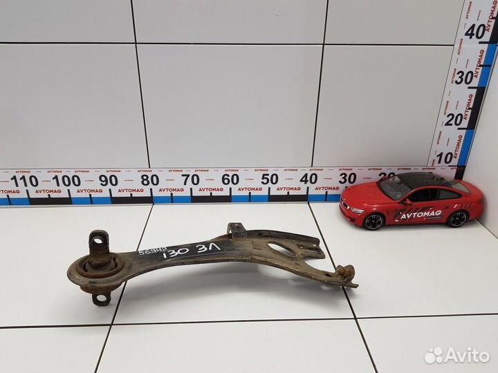 Рычаг продольный задний левый