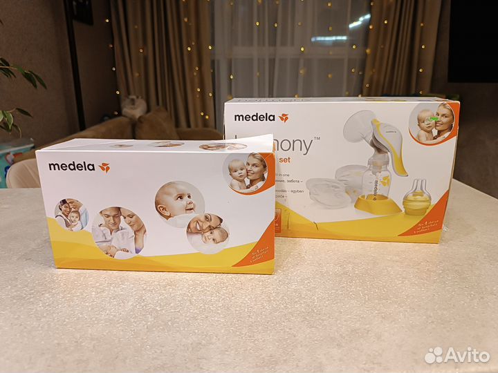 Молокоотсос medela с calma соской