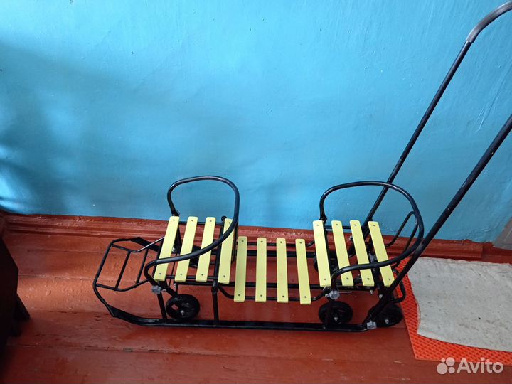 Детские санки на колёсиках для двойни