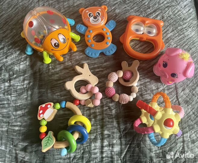 Деревянный прорезыватель погремушки пакетом