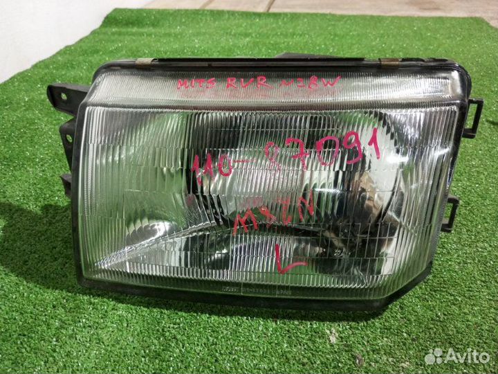 Фара галогеновая левая Mitsubishi Rvr N23W