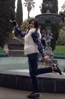 Меховая жилетка