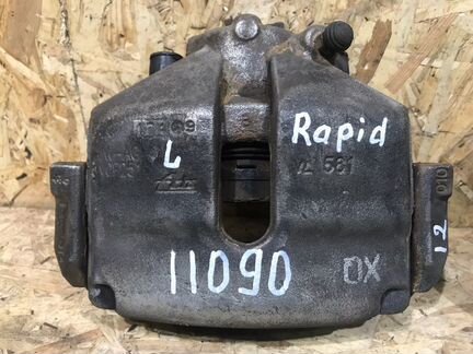 Суппорт передний Skoda Rapid