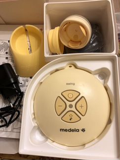 Молокоотсос medela swing + стерилизатор