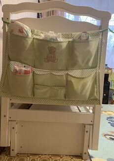 Детская кроватка с маятником